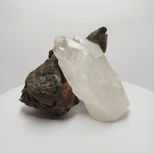 Load image into Gallery viewer, Clear Quartz Point Crystal with Rainbow Inclusions